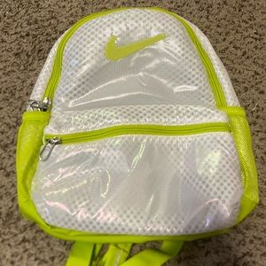 Lime green and white Nike mini carry on bag